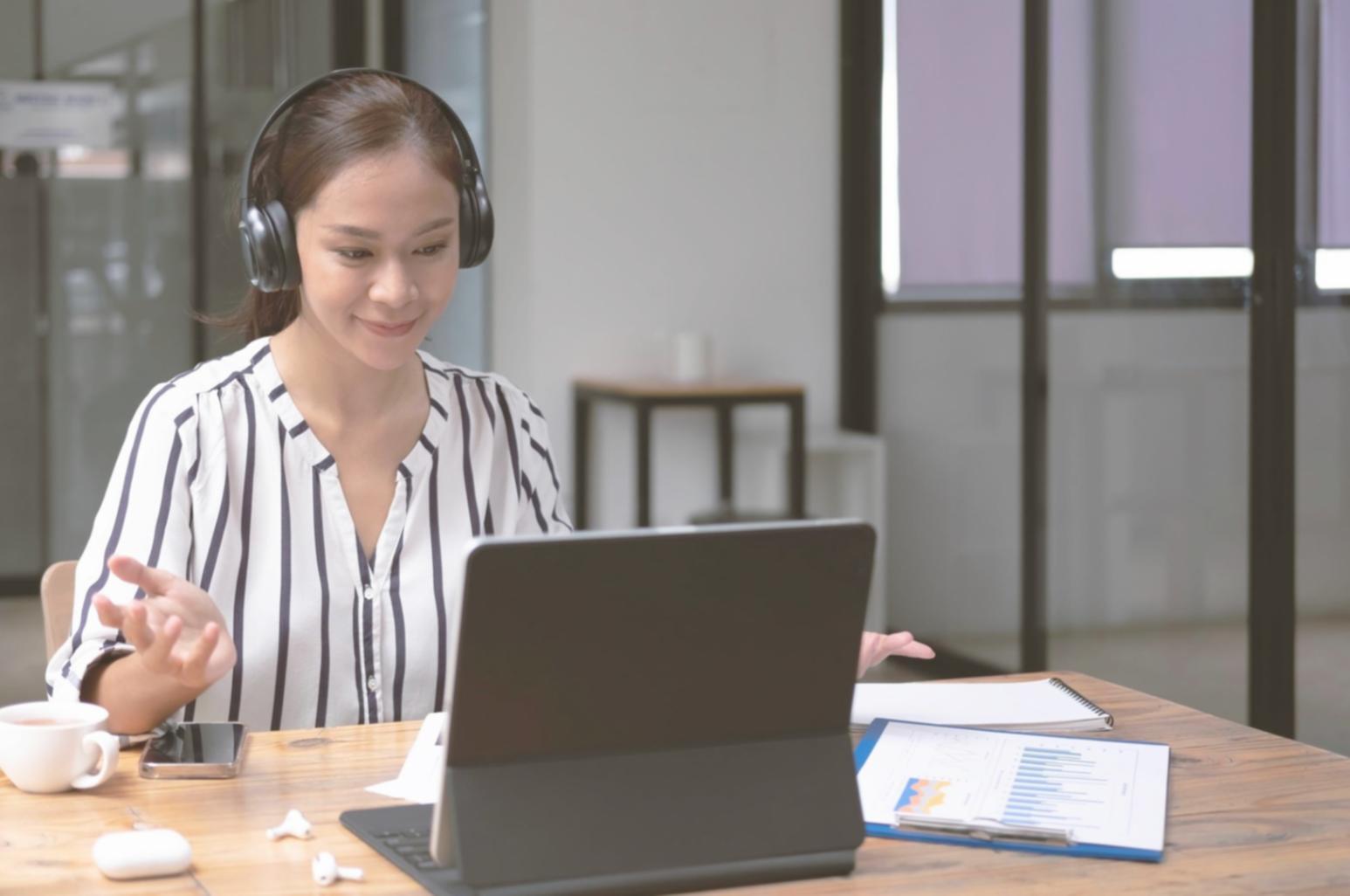 Business professional presenting financial analysis results to colleagues in a modern conference room setting